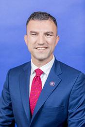 Official portrait of Rudy Yakym III